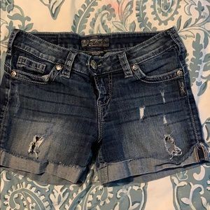 Distressed denim shorts